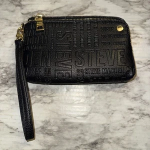 Muñequera/cartera de mano Steve Madden Btrell doble cremallera monograma negra - Imagen 1 de 9