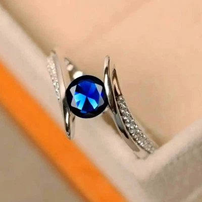 Unique Round Cut Crystal Ring Plated Sapphire and Zircons Size 8.5 - Image 1 of 4