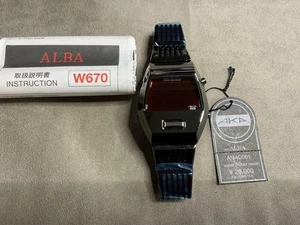 Seiko Alba Aka AMAD001 W670-4000 schwarz mit Tasche - Bild 1 von 18