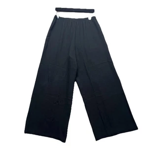 Pantalones transparentes HARARI negros crepé seda cintura elástica talla S se adapta a M-L - Imagen 1 de 10