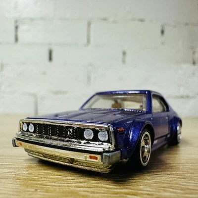 Nissan Skyline C210 púrpura Japan Historics 2 JH2 2018 Premium Real Riders Foto 1 de 4