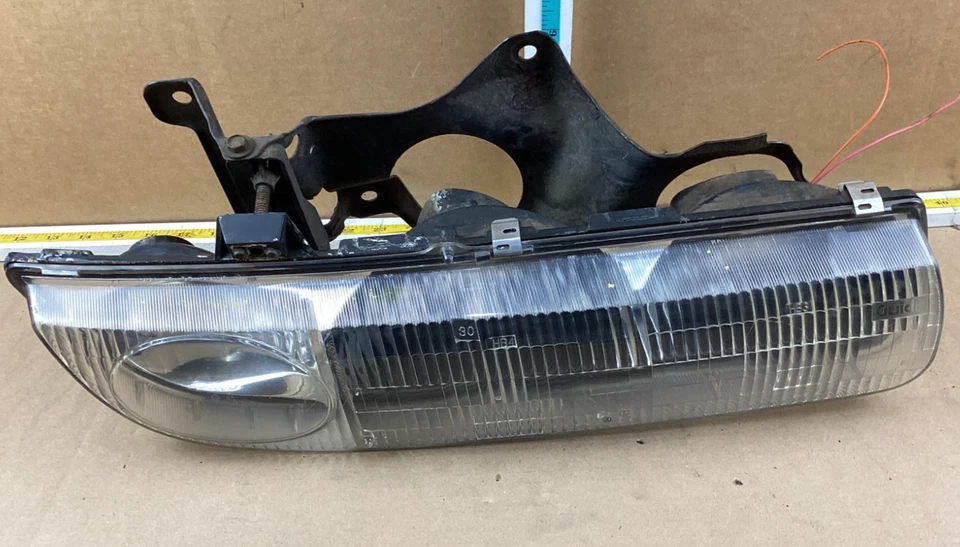 Conjunto de faros laterales de pasajero derecho Saturn serie S 1996-1999 211170 OEM Foto 1 de 4