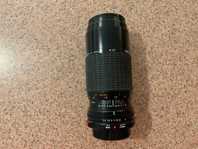 Sigma 75-210mm F/3.5-4.5 Zoom-k iii Macro Focus Lens for Canon FD w cap & cover - Image 1 of 4