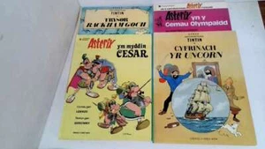 Asterix & Tintin 4 Welsh Language Comic Annuals 4 Llyfrau Comic Cymreig Blynyddo - Picture 1 of 2