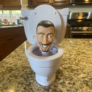 Skibidi Toilette Sammelfigur ca. 12" groß mit Spülgeräusch & Pop Up Kopf - Bild 1 von 9