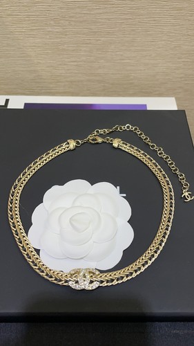 CHANEL catena osso di serpente pelle bianco e nero CCS collana cristallo intarsiato 24C