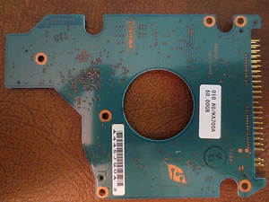 Toshiba MK6025GAS (HDD2189 S ZE01 T) 010 A0/KA200A 60gb 2.5" IDE PCB - Picture 1 of 1