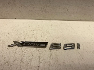 BMW X1 2016-2019 puerta delantera izquierda insignia emblema letras OEM Foto 1 de 4
