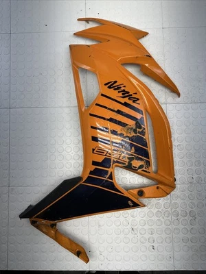 Carenado lateral superior medio izquierdo Kawasaki Ninja 650 EX650 OEM capucha naranja usado Foto 1 de 4