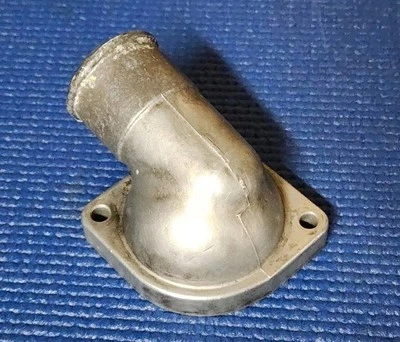 Cubierta de carcasa termostato refrigerante motor Subaru WRX STi 1991-2021 OEM #11060AA061 Foto 1 de 4