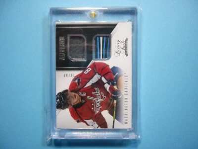 Tarjeta de hockey 2013/14 Panini Pacific Luxury Suite Jersey #64 Alex Oechkin 17/99 Foto 1 de 4