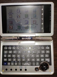 Sharp Zaurus SL C3200 Linux PDA Ręczny komputer Japoński organizer Testowany - Zdjęcie 1 z 12