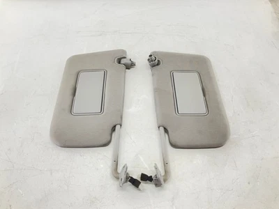 Par de parasol delantero izquierdo y derecho Nissan Rogue 14-17 con iluminación OEM Foto 1 de 4