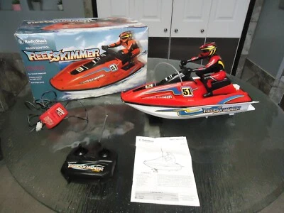 VINTAGE RADIO SHACK RC REEF SKIMMER JET SKI 60-4323 (works great needs battery)# - Image 1 of 4