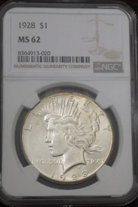 1928 Peace Silver Dollar NGC graded MS 62 - Picture 1 of 4