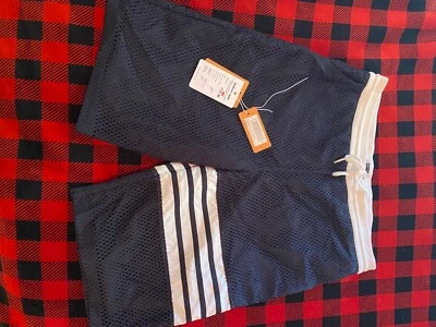 Pantalones cortos de malla thom browne para hombre Foto 1 de 3