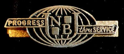 Publicidad de colección UNB Progreso a través del servicio Clip de corbata Barra de corbata tono dorado y negro Foto 1 de 2