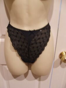 New in pkg xsmall- marked 6 black Lacey thong pantie fits xsmall