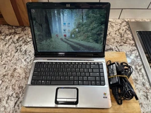 Black HP Pavilion dv2000 Laptop - Wide Screen with Windows - Works fine & Extras - Picture 1 of 5