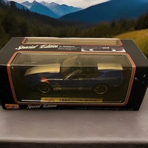 Cerchi Maisto 1996 Chevrolet Corvette blu navy/nero scala 1:18 nuovi! - Foto 1 di 7