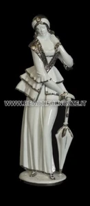 DAMA CON OMBRELLO IN CERAMICA BIANCO PLATINO CON CRISTALLI SWAROVSKI STATUA - Imagen 1 de 1
