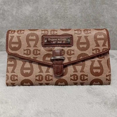 Cartera sin asas Etienne Aigner tela beige con logotipo de herradura marrón y ribete de cuero Foto 1 de 4