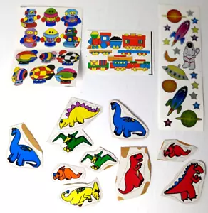 Lotto adesivi vintage spazio, astronauta, robot, treno, dinosauri, dirigibili - Foto 1 di 5