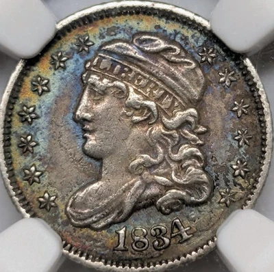 Media moneda de diez centavos 1834 AU53 NGC con tonificación arco iris Foto 1 de 2