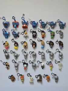 Lotto di 42 clip borsa personaggi Disney - Foto 1 di 8