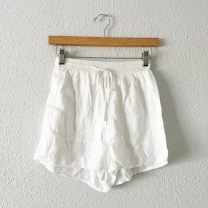 Pantaloncini donna Princess Polly 2 bianchi vita alta floreale spiaggia boho bohemien estivi - Foto 1 di 8