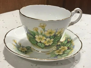 REGENCY Eng. Taza y platillo de café de té Bone China flores amarillas hojas verdes - Imagen 1 de 4