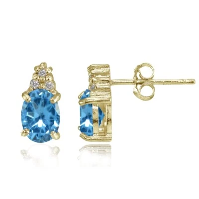 Gold Tone over Silver Simulated Blue Topaz and CZ Accent Oval Stud Earrings - Image 1 of 4
