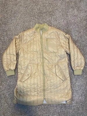 Jaqueta longa feminina Nike Sportswear Therma-FIT Tech Pack bege tamanho XL - Imagem 1 de 4