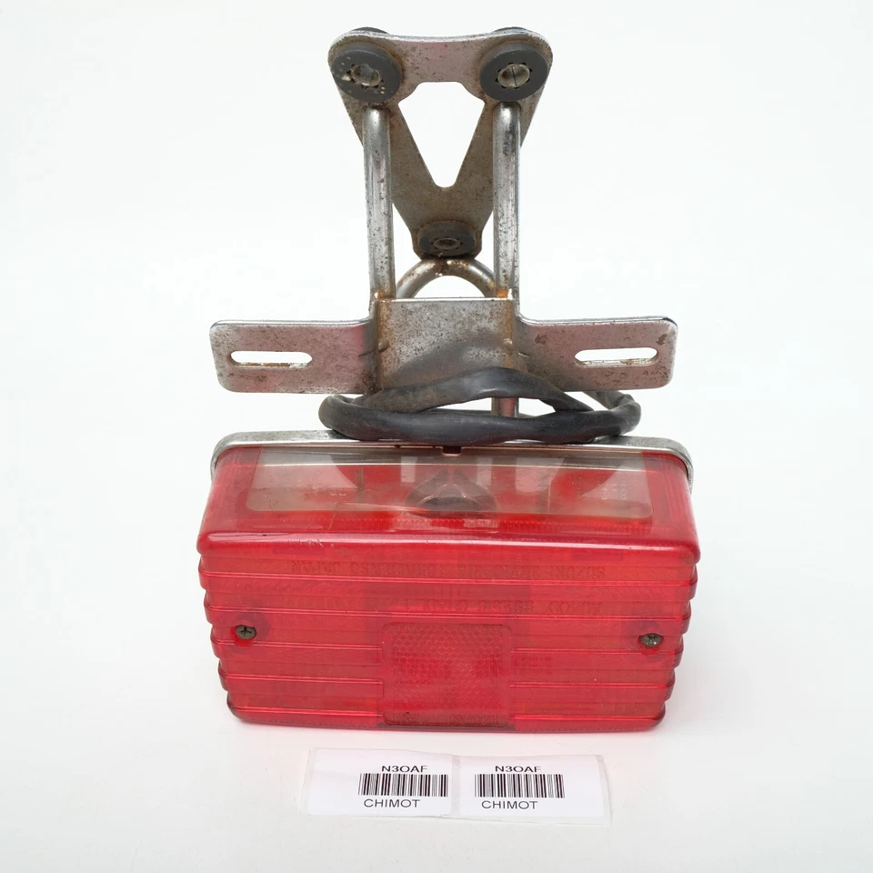 Se adapta a Suzuki FR80 A100 GP100 GP125 GS125 lámpara de luz trasera con soporte Foto 1 de 4