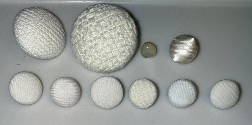 Estate Lot Of 9 White Fabric Covered Shank Buttons And 1 Tiny Pearl Shank Button - Image 1 of 3