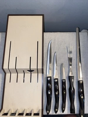 Juego de cuchillos vintage CUTCO naranja/marrón manijas de mármol horquillas esparcidoras colgantes en la pared Foto 1 de 4