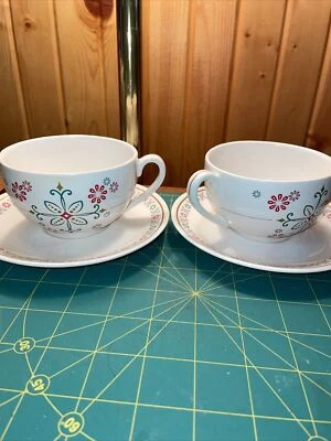 Juego de 2 tazas de té y platillos Starbucks Holiday 2006 diseño de flores rojas/verdes Foto 1 de 4