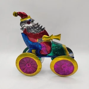 Figura de Navidad de Papá Noel en coche de hojalata arte popular mexicano de colección LEER - Imagen 1 de 20
