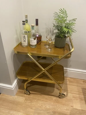 Mid Century Vintage Folding Gold-tone and Wood-effect Formica Drinks Trolley - Image 1 of 4
