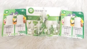 Air Wick Plug in Scented Oil, 5 Refills, Fresh New Day Palm Breeze + 4  Warmers - Picture 1 of 8