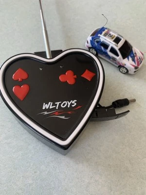 WLtoys Mini RC Car With Can’t Remote Control Plus 1 Extra Car And 1 Extra Remote - Image 1 of 4