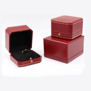 Caja de anillos de cuero octogonal vintage inspirada en adornos dorados caja de exhibición de joyas negra - Imagen 1 de 9