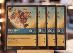 Juego de Juego Disney Lorcana - Pato Donald punteando sus cosas 144/204 - SIN papel de aluminio x4 - Imagen 1 de 1
