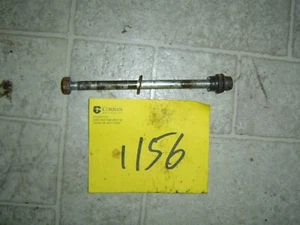 1981 KAWASAKI KM100 KM 100  FRONT WHEEL AXLE OEM - Picture 1 of 1
