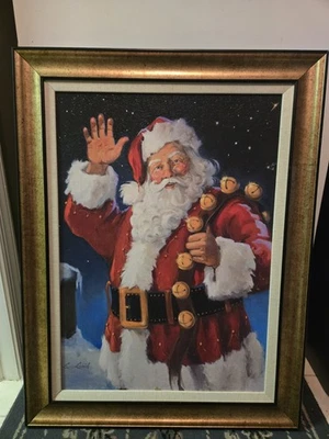 Susan Comish Santa sosteniendo campanas de trineo Navidad litografía enmarcada 34 X 26 Foto 1 de 3