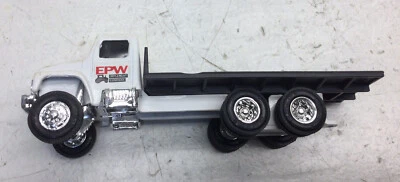 Ertl EPW Flat Bed Equipment hauler￼ Truck. die cast  1/64 - Image 1 of 4