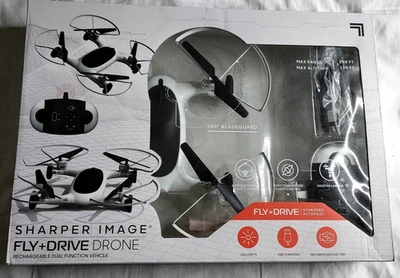 SHARPER IMAGE FLY + DRIVE 7" DRONE RECHARGEABLE DUAL FUNCTION 2.4GHZ LONG RANGE - Image 1 of 4