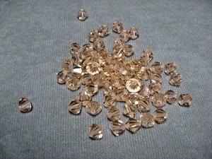 Bicono perle cristallo swarovski pesca chiara 8 mm - Foto 1 di 3