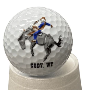 Pelota de golf Nike con logotipo de vaquero de rodeo de Cody Wyoming - Imagen 1 de 3