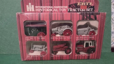 Vintage  ERTL International Harvester Historical Toy Tractor Set 1/64 #1739 - Image 1 of 4